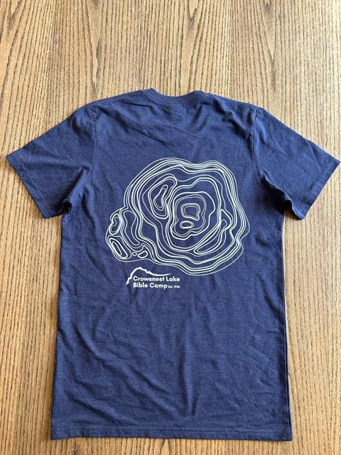 Crow Staff T-Shirt 2024 back. It has a swirl of lines, like a topographical map, and the Crow Logo